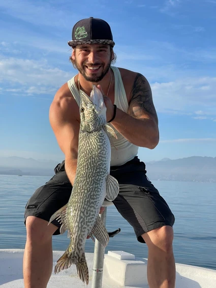 Fishing from a motorboat with a certified instructor on Lake Garda 8